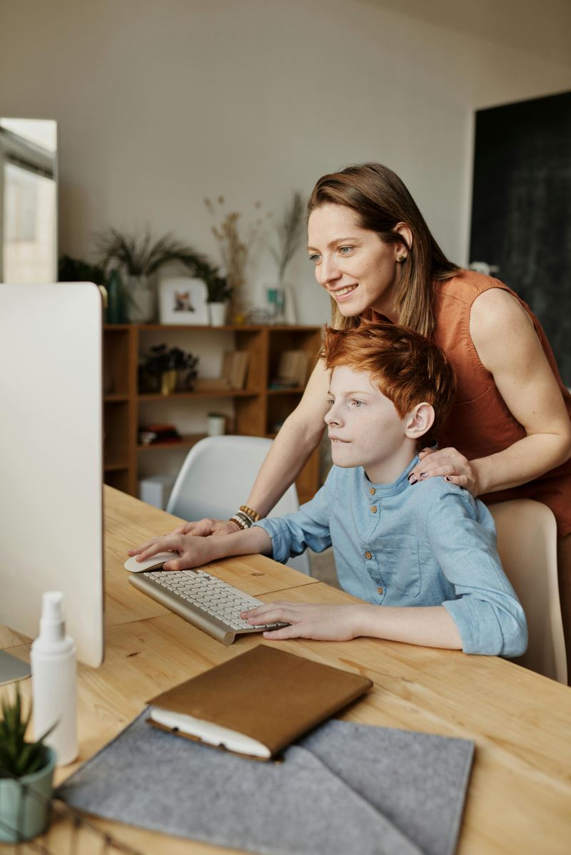 A telehealth session on a laptop
